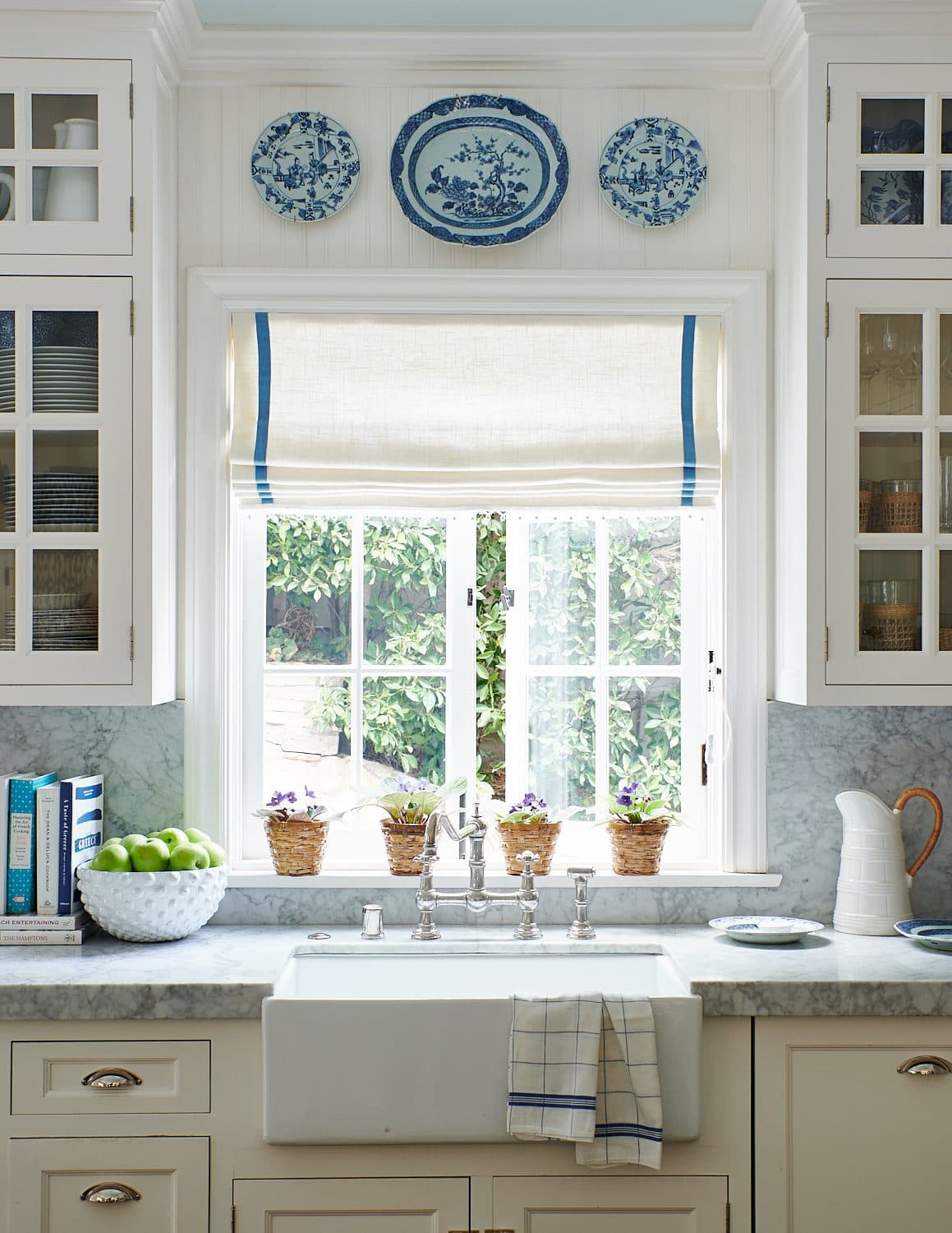 Custom Roman shades in a Los Angeles–area living room by Valley Studio