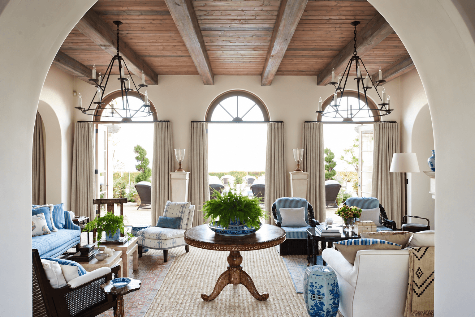 Living room designed by Mark D. Sikes — Desized Solid Linen drapery at the window