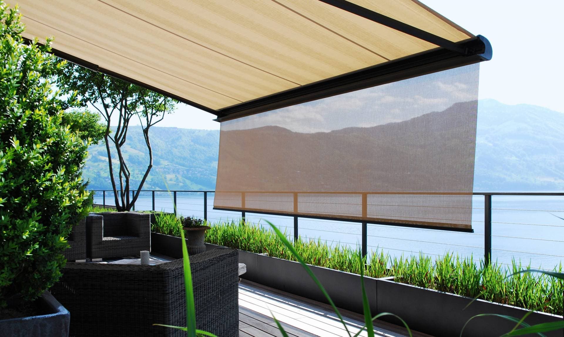 Awning with drop down shade