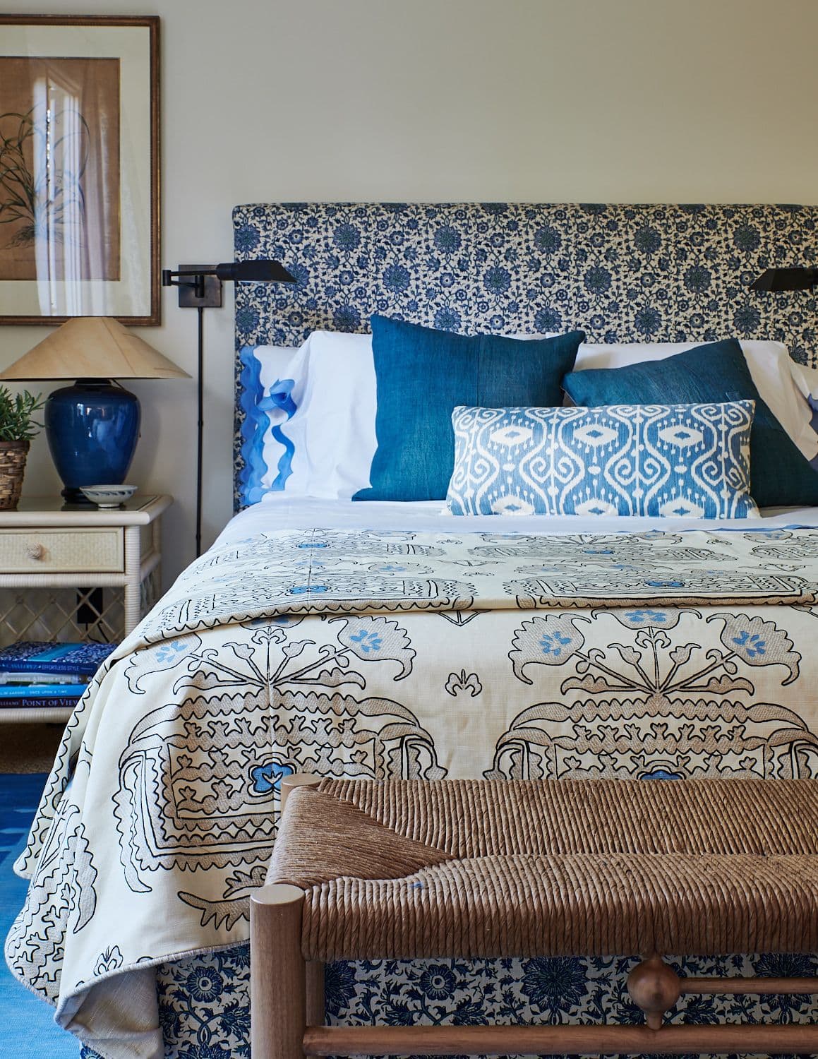 Upholstered bed with custom throw pillows